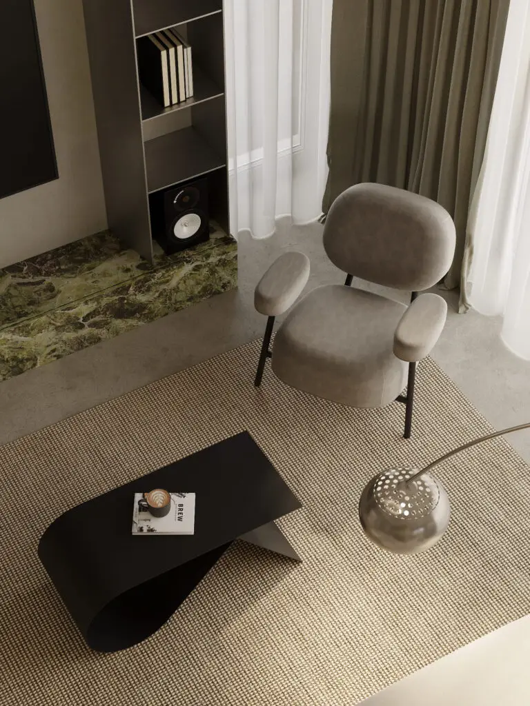 Cozy reading nook with a sculptural black coffee table, modern armchair, and green marble TV base